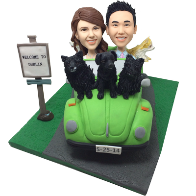 Couple and Gog in Car Bobbles