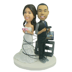 wrapped up in games wedding cake  toppers