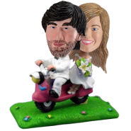 Couple On Motor Scooter